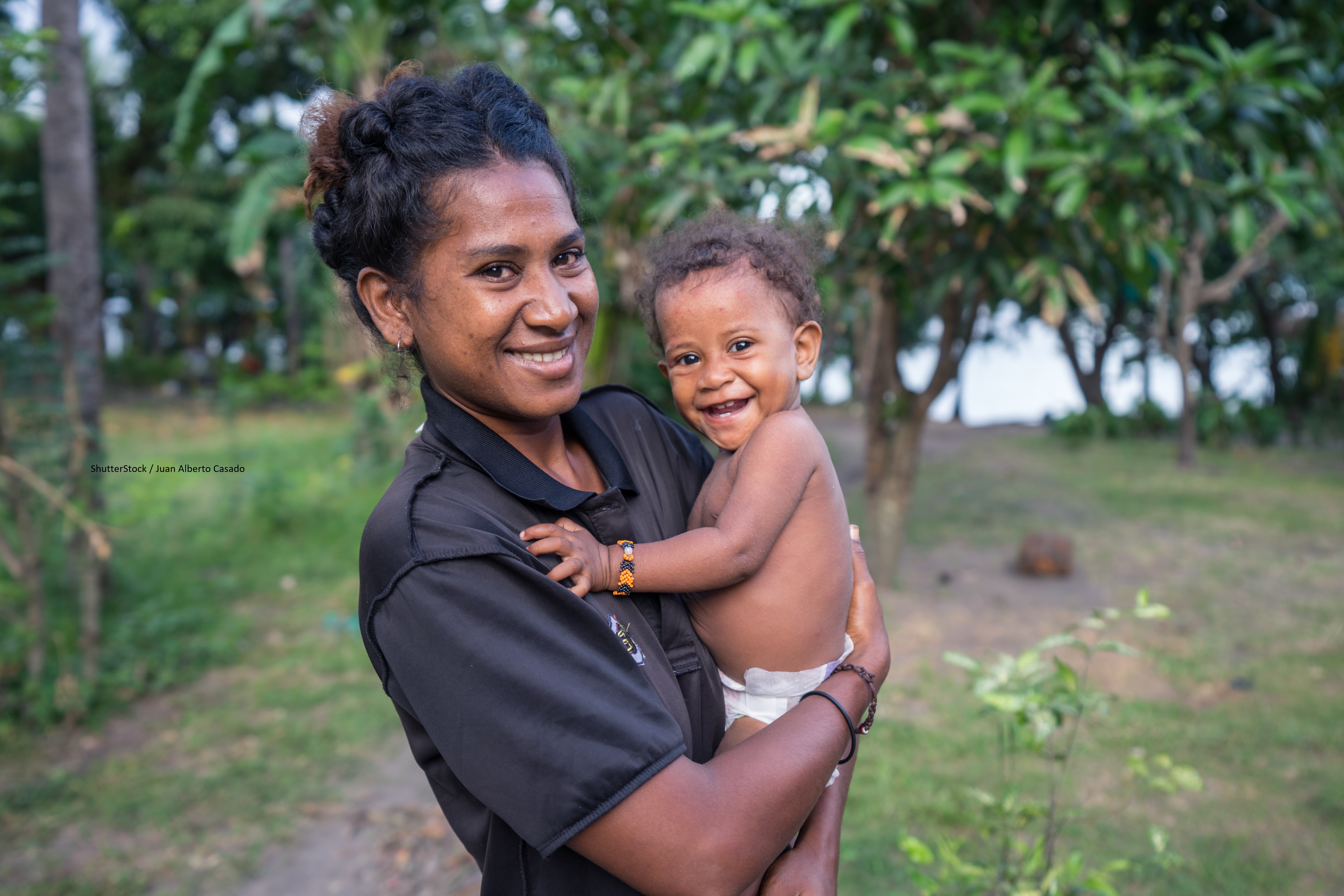 Photo of mother holding baby